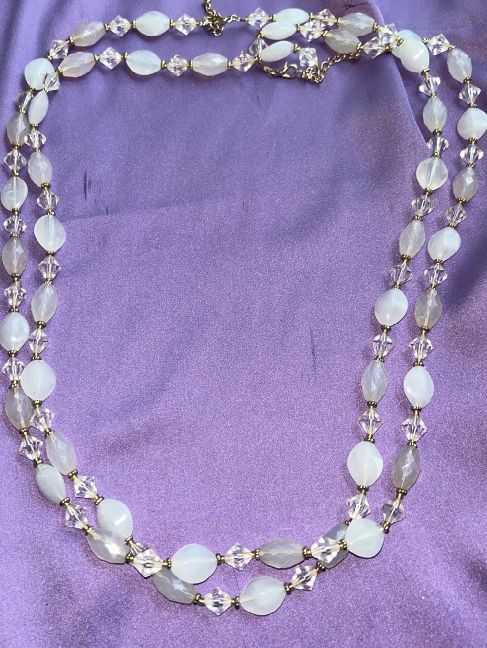Elegant Double-Strand White Beaded Necklace with Gold Accents